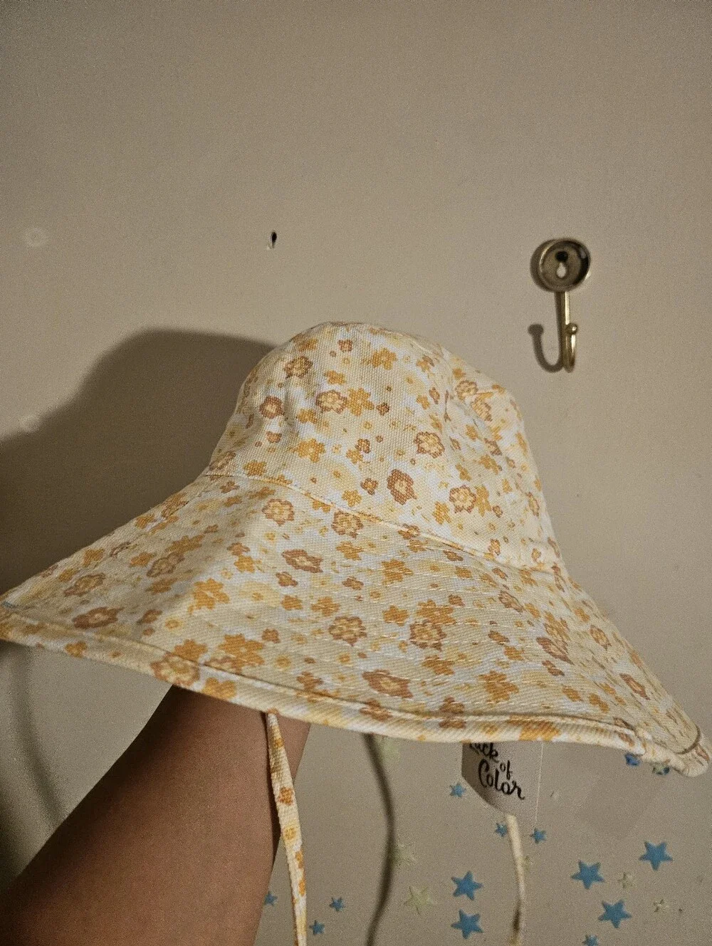 Lack of Color Holiday Bucket Hat in the Peach Bloom pattern